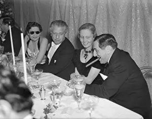 Basil Rathbone and Friends Sitting at Table