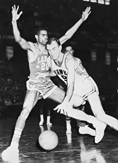 Basketball Favorites Tom Hawkins and Bob Petitt in Action