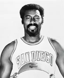 Basketball Legend Wilt Chamberlain Posing with Basketball in Hand