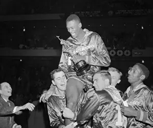 Bill Russell Prints: Basketball Player Bill Russell Riding on Teammates Shoulders