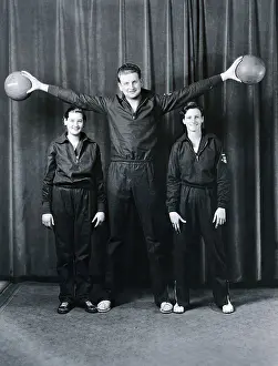 Prints of (Original Caption). Not content with the laurels she has won in many other branches of sport, Babe Didrikson, girl athletic marvel has joined a basketball aggregation Hoops Through Time: A Visual Journey of Basketball History: Basketball Player Towers over Babe Didrikson