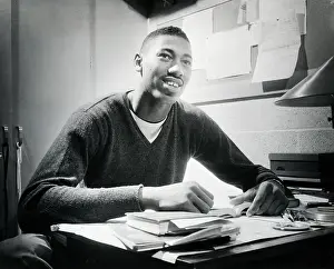 Studying Prints: Basketball Player Wilt Chamberlain In College Dorm Room