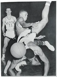 Basketball Players Colliding On Court