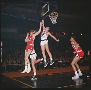 Basketball Players Fighting for Score