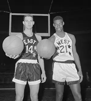 Basketball Players Pose with Balls