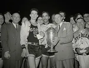 Basketball Players and Trophy