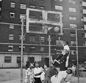 Basketball Star Harlan Ludewig Playing With Neighborhood Children