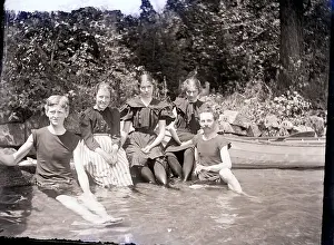 Canoe Prints: Bathers Get Feet Wet In Lake