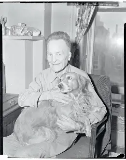 Battling Nelson Relaxing with His Dog
