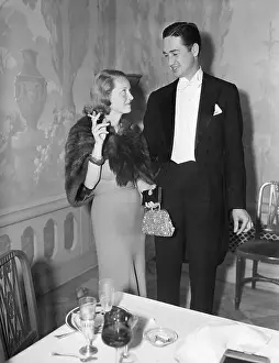 Dining Room Prints: B.Davis Smokes Stands W/Tuxedoed Man