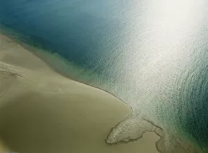 Empty beach and calm sea, aerial view