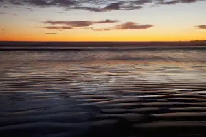Prints of The Beach At Cox Bay Reflects The Colors Of The Sunset Near Tofino; British Columbia Canada UNESCO World Heritage Prints: The Beach At Cox Bay Reflects The Colors Of The Sunset Near Tofino; British Columbia Canada