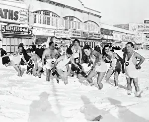 Beach Revelers in Snow Pulling Sled