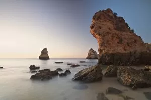 Faro District Portugal Collection: Beach with rocks at sunrise, Lagos, Portugal, Europe