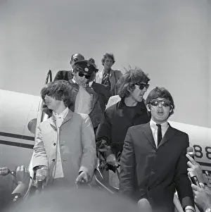 The Beatles Coming Off the Plane