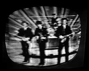 The Beatles Ed Sullivan Show Performance on TV Screen During Original Broadcast