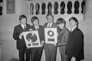 Beatles Receiving Gold Records