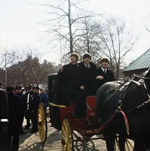 The Beatles Riding in a Carriage