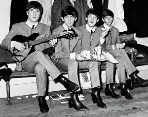 The Beatles Seated on a Bench, 1963
