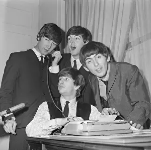 Beatles Sitting in Hotel Room