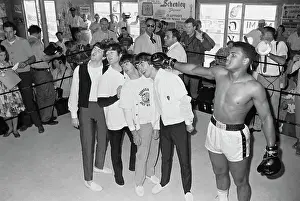 The Beatles Training with Boxer Cassius Clay