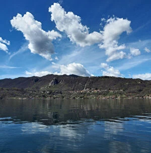 Images Dated 14th April 2016: Beautiful Clouds And Blue Sky On Lake Orta In Northern Italy