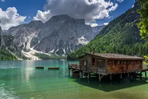 Beautiful landscape of Braies Lake (Lago di Braies) with wooden bridge
