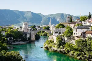 Mostar Prints: Beautiful view on Mostar city with old bridge on Neretva river in Bosnia and Herzegovina