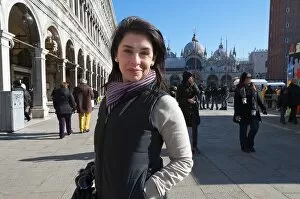 Beautiful woman in St. Marks Square Venice Italy
