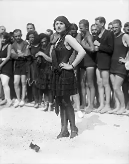 Beauty Contestant Posing in Front of Crowd