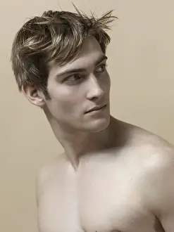 Thoughtful Prints: Beauty portrait of a young man with moving hair