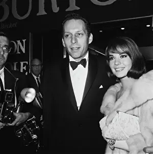 Prints of American actress Natalie Wood (1938 - 1981) and producer Arthur Loew Jr. (1925 - 1995) at the premiere of the film Becket, USA, 1964. (Photo by Archive Photos/Getty Images) Grace, Glamour & Timeless Elegance: Becket Premiere