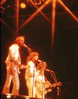 Prints of Pop group Bee Gees, circa 1970. (Photo by Michael Ochs Archives/Getty Images) A Visual Journey Through the Legendary Brothers’ Timeless Legacy: The Bee Gees