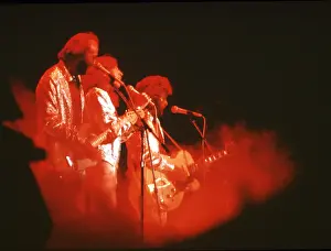 Prints of Pop group Bee Gees, circa 1970. (Photo by Michael Ochs Archives/Getty Images) A Visual Journey Through the Legendary Brothers’ Timeless Legacy: The Bee Gees