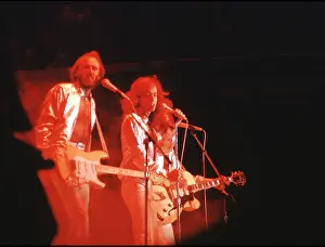 Prints of Pop group Bee Gees, circa 1970. (Photo by Michael Ochs Archives/Getty Images) A Visual Journey Through the Legendary Brothers’ Timeless Legacy: The Bee Gees