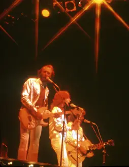 Prints of Pop group Bee Gees, circa 1970. (Photo by Michael Ochs Archives/Getty Images) A Visual Journey Through the Legendary Brothers’ Timeless Legacy: The Bee Gees