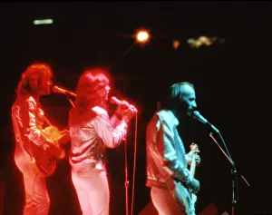Prints of Pop group Bee Gees, circa 1970. (Photo by Michael Ochs Archives/Getty Images) A Visual Journey Through the Legendary Brothers’ Timeless Legacy: The Bee Gees