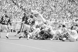 Tackling Prints: Bell Leaps for First Down