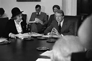Bella Abzug Sitting at Table with President Jimmy Carter