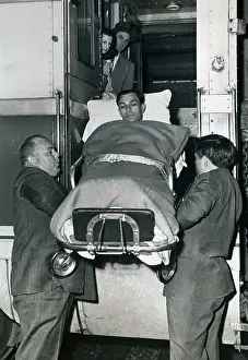 Personal Attendant Prints: Ben Hogan Being Lifted on a Gurney