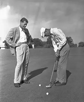Ben Hogan Putting as Byron Nelson Watches