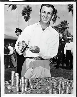 Ben Hogan Rubbing Silver Coins for Good Luck
