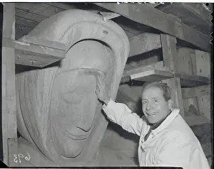 Beniamino Bufano Touching Face of Sculpture