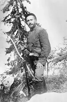 Benito Mussolini Posing with Rifle