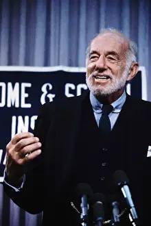 Benjamin Spock Smiles and Talks at Podium