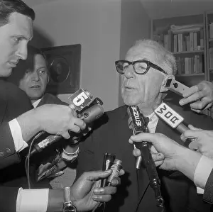 Benjamin Spock Talking into Microphones