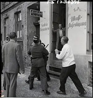 Distributing Prints: Berliners Riot Over Food Distribution 1953