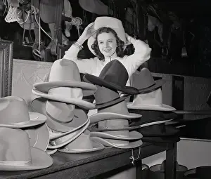 Trying On Prints: Berna Ann Cooper Trying on Cowboy Hat