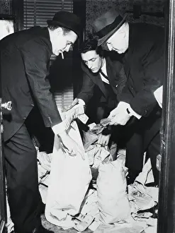 Bernard Kay, George Martes, and Edward Egan Confiscating Money