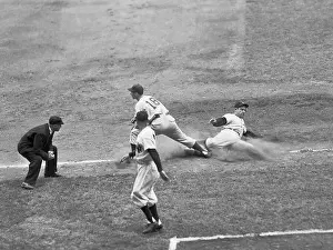 Berra Sliding Safely into Third Base
